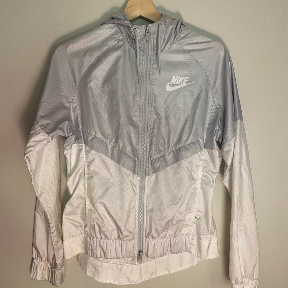 Grey and white Nike windbreaker